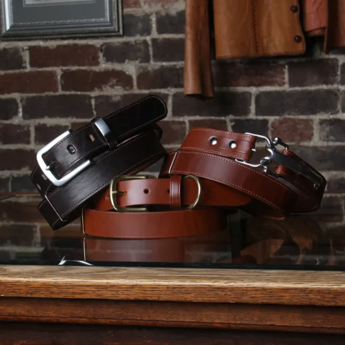 three Italian bridle leather belt sitting in the Col. Littleton retail store