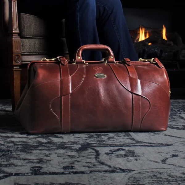 grip bag sitting on the carpet in front of a fire place