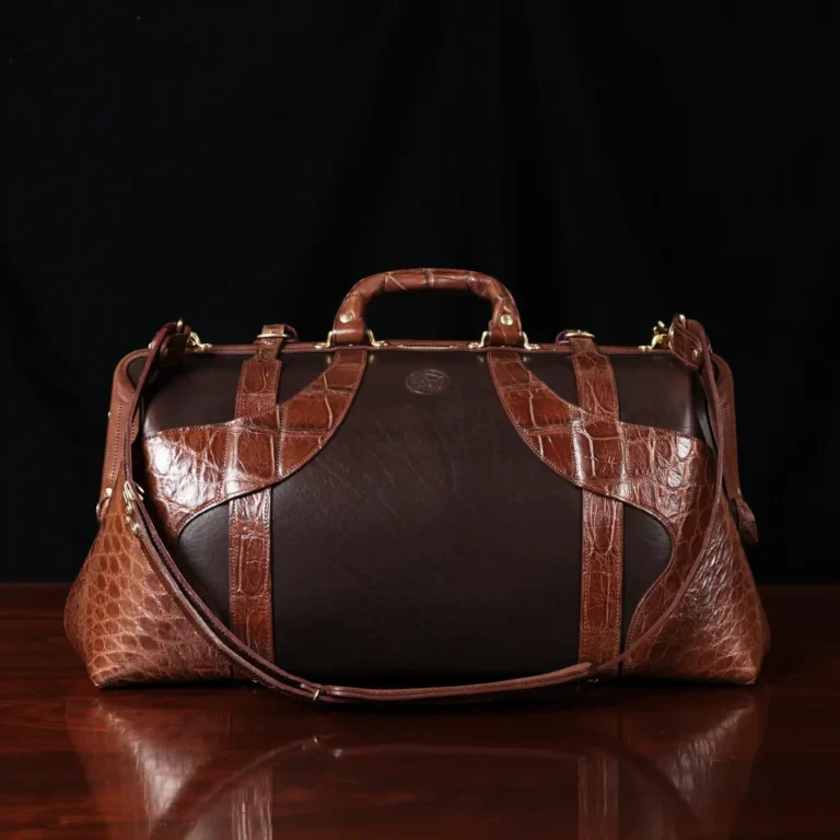 no 5 grip in tobacco buffalo with brown american alligator trim - back view - on a wood table with black background - ID 001