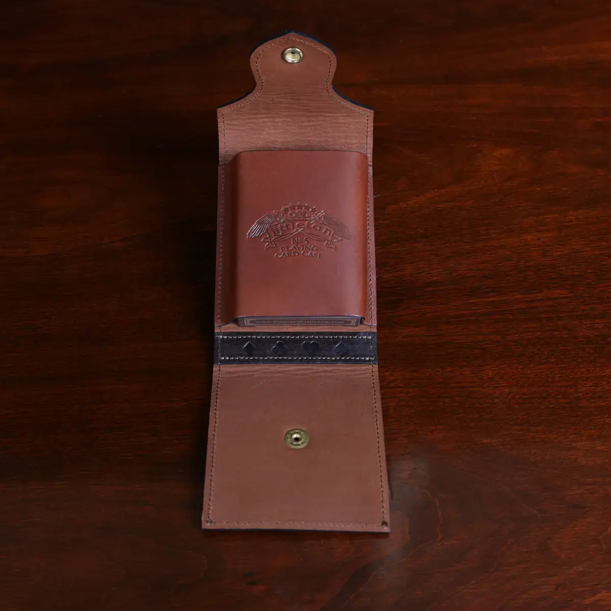 Leather playing card case, hold one deck of playing cards. showing the open view