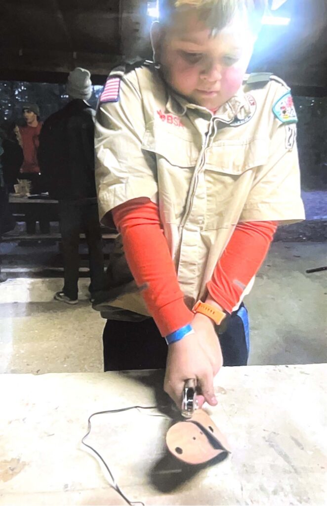 A Letter From a Boy Scout 5 marshall punching holes in leather project