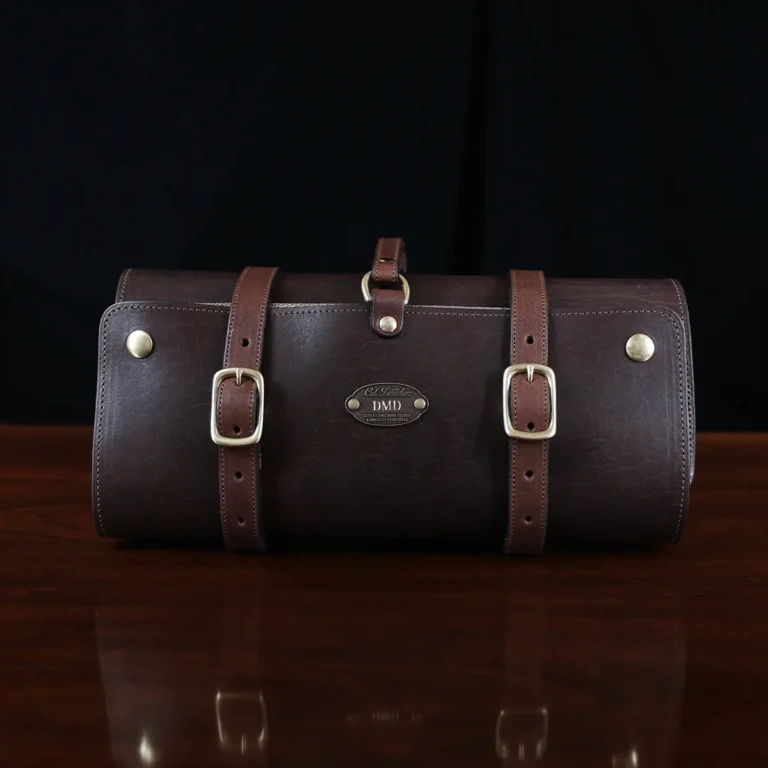 No. 2 Shave Dopp Kit in tobacco buffalo with No. 8 Khaki Cotton Canvas Lining - front view on a wooden table