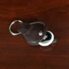 no10 tobacco buffalo key ring with alligator strap with personalization - open with airtag
