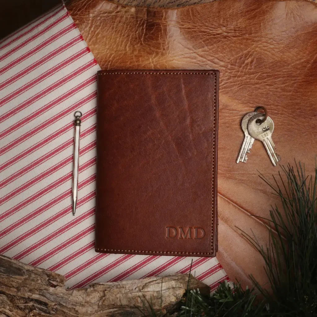 Leather Pocket Journal with pen and keys in Christmas setting