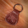 back side of a brown lizard key ring
