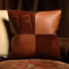 front side of a branded leather pillow