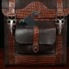 no 9 rover backpack in tobacco buffalo with American Alligator trim - id 001 - front view of pocket with phone