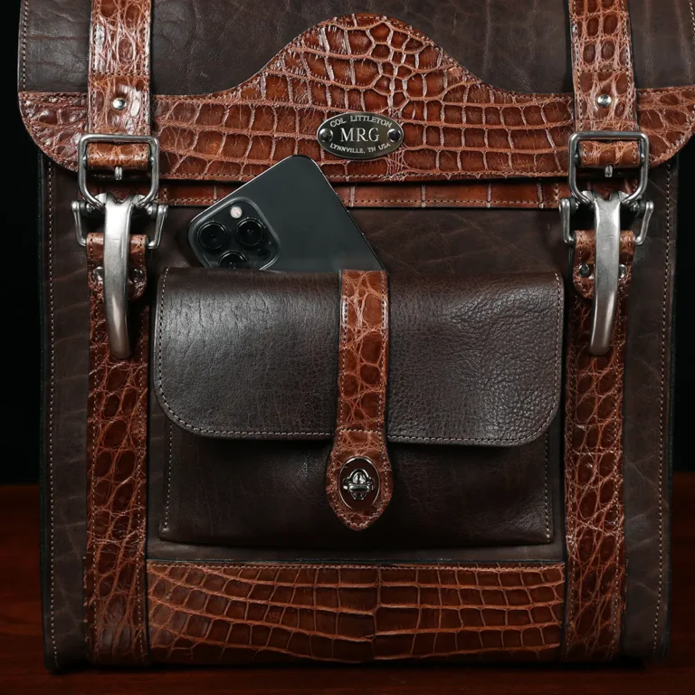 no 9 rover backpack in tobacco buffalo with American Alligator trim - id 001 - front view of pocket with phone