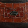no 9 rover backpack in tobacco buffalo with American Alligator trim - id 004 - front view of serial number