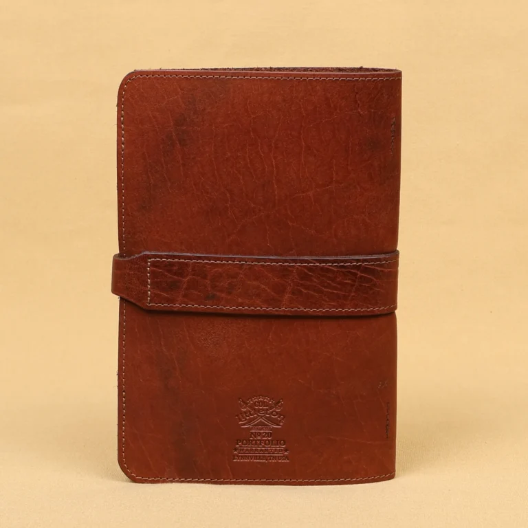 back side of colonel littletons private stock journal with a rugged leather