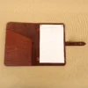 open side of colonel littletons private stock journal with a rugged leather
