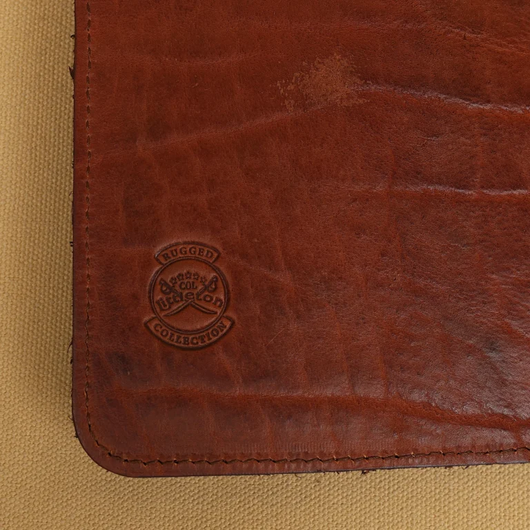 stamp side of colonel littletons private stock journal with a rugged leather