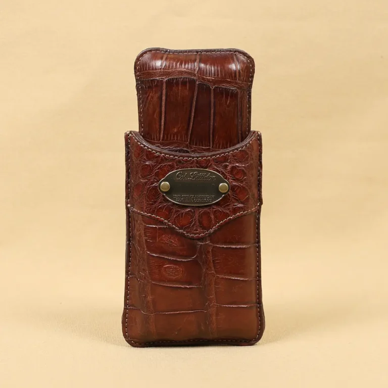 A leather Cigar Case in American Alligator showing the front with brass hardware - id 001