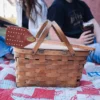 Italian Bridle Leather and American oak flyswatter propped on a picnic basket