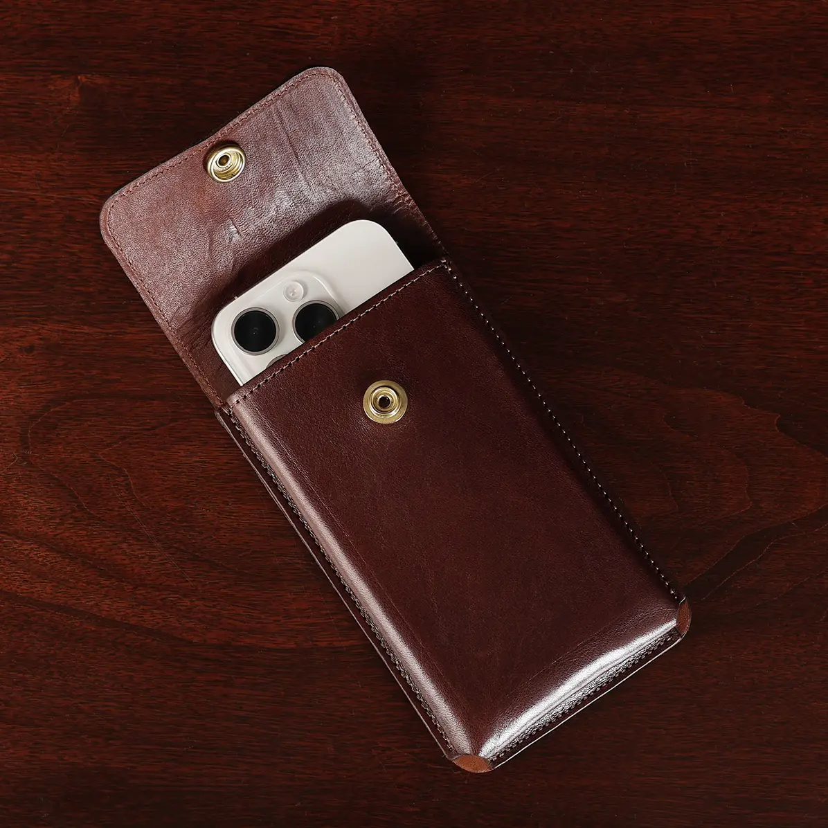 View larger image of No. 60 phone holster in vintage brown - showing the front open with phone